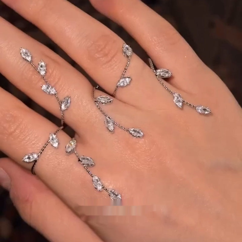 Eternal Bloom: Titanium Steel Diamond Cross Leaf Ring