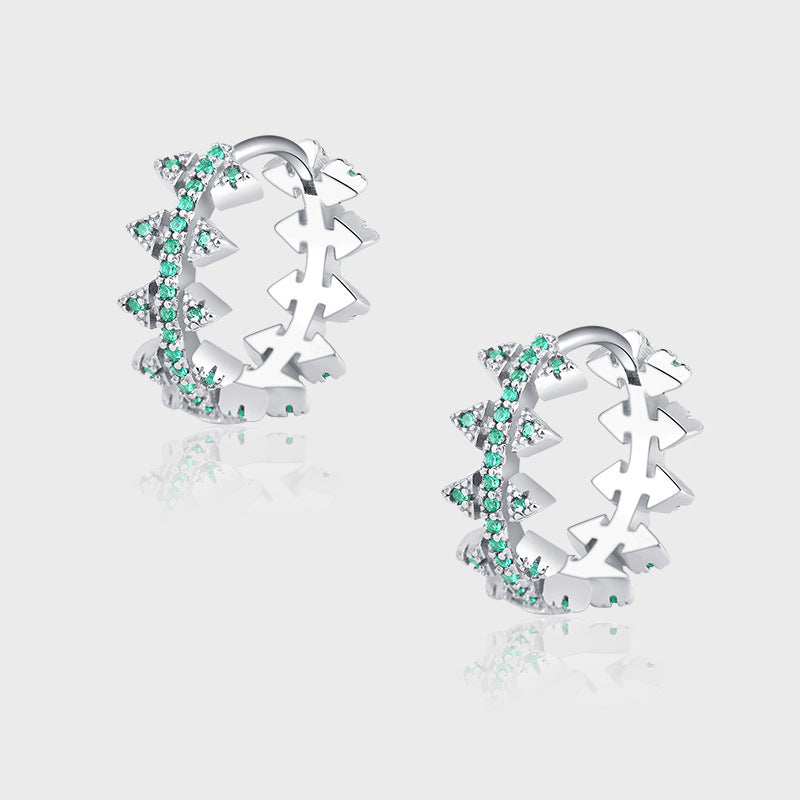 Boucles d'oreilles rivetées en zircon vert