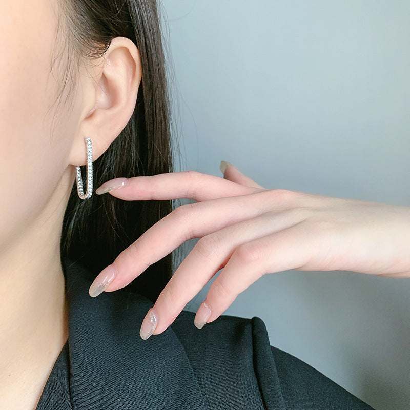Boucles d'oreilles géométriques en forme de U