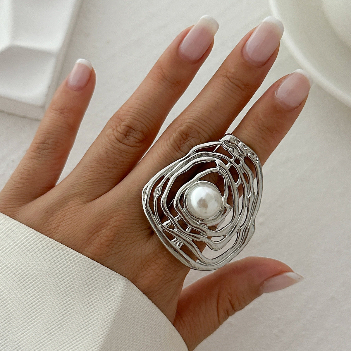 Ethereal Labyrinth: Irregular Hollow-Out Braided Alloy Open Ring